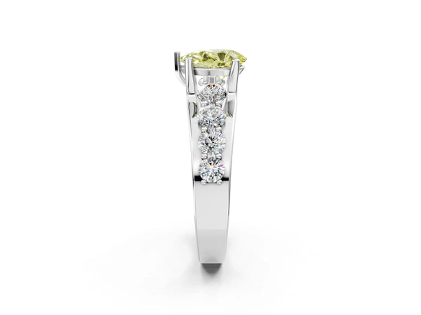Platinum Fancy Yellow Pear  Brilliant Solitaire with Side Stones on a Pave Band and Four-Prong Setting