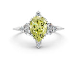 White gold Fancy Yellow Pear Cut Brilliant Diamond with Cluster Setting on a Beaded Band and Four-Prong Setting_54