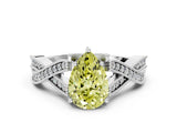White gold Fancy Yellow Pear Cut Cut Diamond Twisted Band with Milgrain Pave Setting and Four-Prong Setting