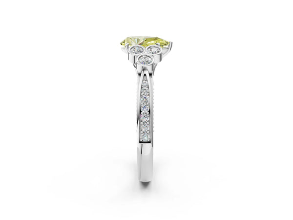 Platinum Fancy Yellow Pear  Cut Diamond Engagement Ring with Bezel Set Round Side Stones and Prong Setting