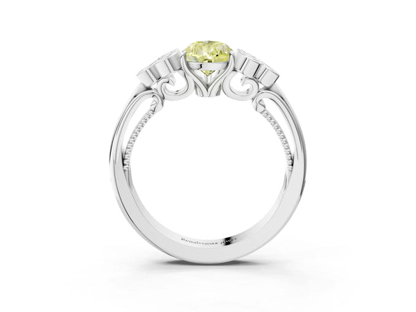 Platinum Fancy Yellow Pear  Cut Diamond Engagement Ring with Bezel Set Round Side Stones and Prong Setting