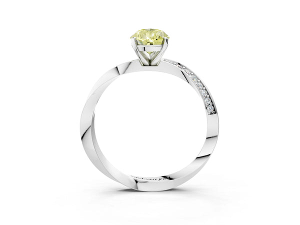 White gold Fancy Yellow Pear Cut Diamond Engagement Ring with Side Stone Accents and Four-Prong Setting