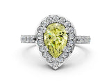 White gold Fancy Yellow Pear Cut Diamond Halo Ring with Pavé Band and Prong Setting