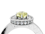 White gold Fancy Yellow Pear Cut Diamond Milgrain Halo Engagement Ring with Round Pavé Band and Prong Setting_16