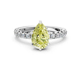 White gold Fancy Yellow Pear Cut Diamond Pavé Solitaire Ring with Round Band and Prong Setting_13