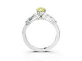 White gold Fancy Yellow Pear  Cut Diamond Ring with Baguette Side Stones, Channel Set Band, and Four-Prong Setting_39