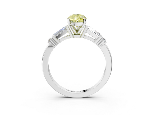Platinum Fancy Yellow Pear  Cut Diamond Ring with Baguette Side Stones, Channel Set Band, and Four-Prong Setting