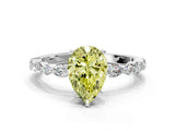 White gold Fancy Yellow Pear Cut Diamond Ring with Marquise and Round  Side Stones and Four-Prong Setting_65