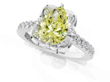 White gold Fancy Yellow Pear Cut Diamond Ring with Pavé Band and Floral Prong Setting_40