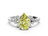 White gold Fancy Yellow Pear Cut Diamond Ring with Side Stones and Four-Prong Setting_137