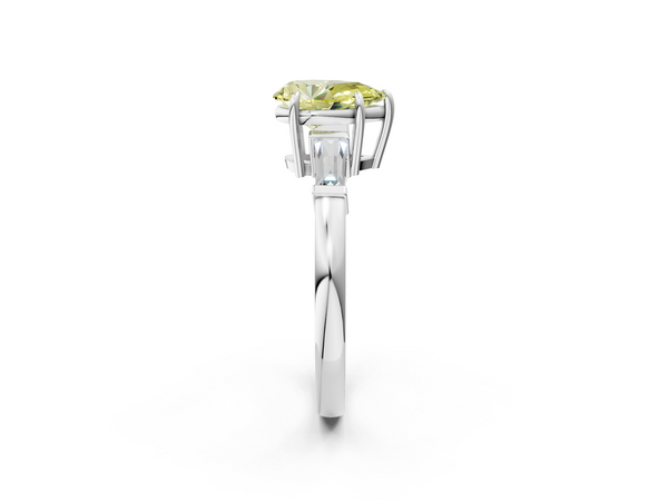 Platinum Fancy Yellow Pear  Cut Diamond Ring with Tapered Baguette Side Stones in Four-Prong Setting
