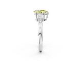 White gold Fancy Yellow Pear  Cut Diamond Ring with Tapered Baguette Side Stones in Four-Prong Setting_5