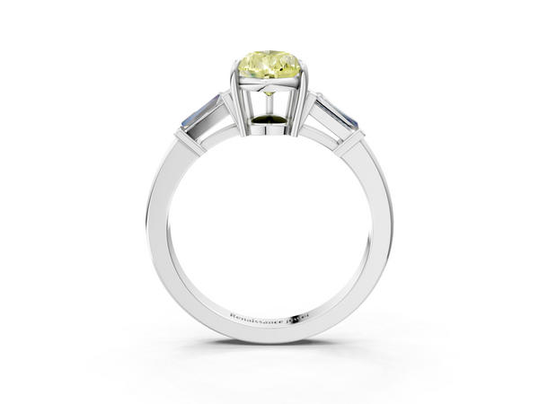 Platinum Fancy Yellow Pear  Cut Diamond Ring with Tapered Baguette Side Stones in Four-Prong Setting