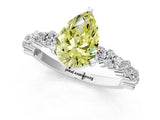 White gold Fancy Yellow Pear Cut Diamond Side Stone Solitaire Ring with Round  and Four-Prong Setting_25