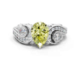 White gold Fancy Yellow Pear Cut Diamond Solitaire Ring with Milgrain Pavé Band and Four-Prong Setting_264