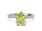 White gold Fancy Yellow Pear Cut Diamond Solitaire Ring with Round  Pavé Band and Prong Setting_129