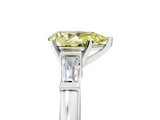 White gold Fancy Yellow Pear  Cut Diamond Solitaire Ring with Tapered Baguette Accents and Four-Prong Setting_67