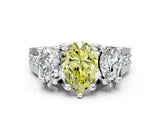 White gold Fancy Yellow Pear Cut Diamond Three-Stone Ring with Channel Set Band and Four-Prong Setting_61