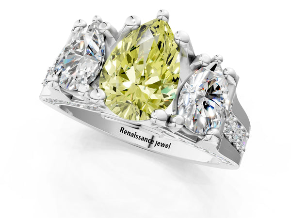 White gold Fancy Yellow Pear Cut Diamond Three-Stone Ring with Channel Set Band and Four-Prong Setting
