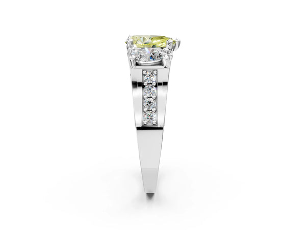 White gold Fancy Yellow Pear Cut Diamond Three-Stone Ring with Channel Set Band and Four-Prong Setting