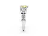 White gold Fancy Yellow Pear Cut Diamond Three-Stone Ring with Channel Set Band and Four-Prong Setting_63