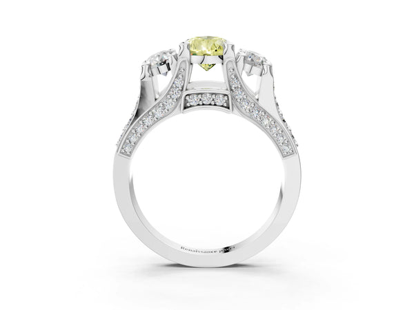 White gold Fancy Yellow Pear Cut Diamond Three-Stone Ring with Channel Set Band and Four-Prong Setting