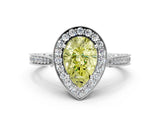 White gold Fancy Yellow Pear Cut Halo Diamond Engagement Ring with Split Shank Band and Four-Prong Setting