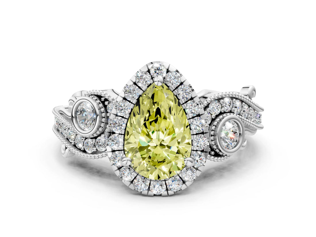 White gold Fancy Yellow Pear Cut Halo Diamond Ring with Milgrain and Bezel Accents on a Split Shank Band