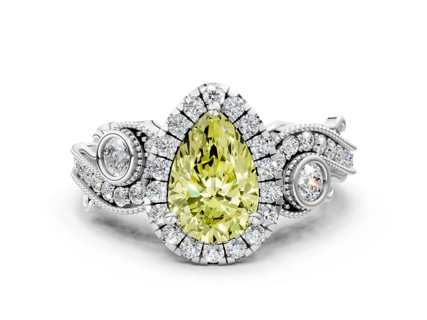 White gold Fancy Yellow Pear Cut Halo Diamond Ring with Milgrain and Bezel Accents on a Split Shank Band