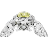 White gold Fancy Yellow Pear Cut Halo Diamond Ring with Milgrain and Bezel Accents on a Split Shank Band_4