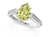 White gold Fancy Yellow Pear Cut Solitaire Cathedral Diamond Engagement Ring with Channel-Set Band and Four-Prong Setting_16