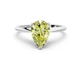 White gold Fancy Yellow Pear Cut Solitaire Diamond Ring with Six-Prong Setting and Classic Band