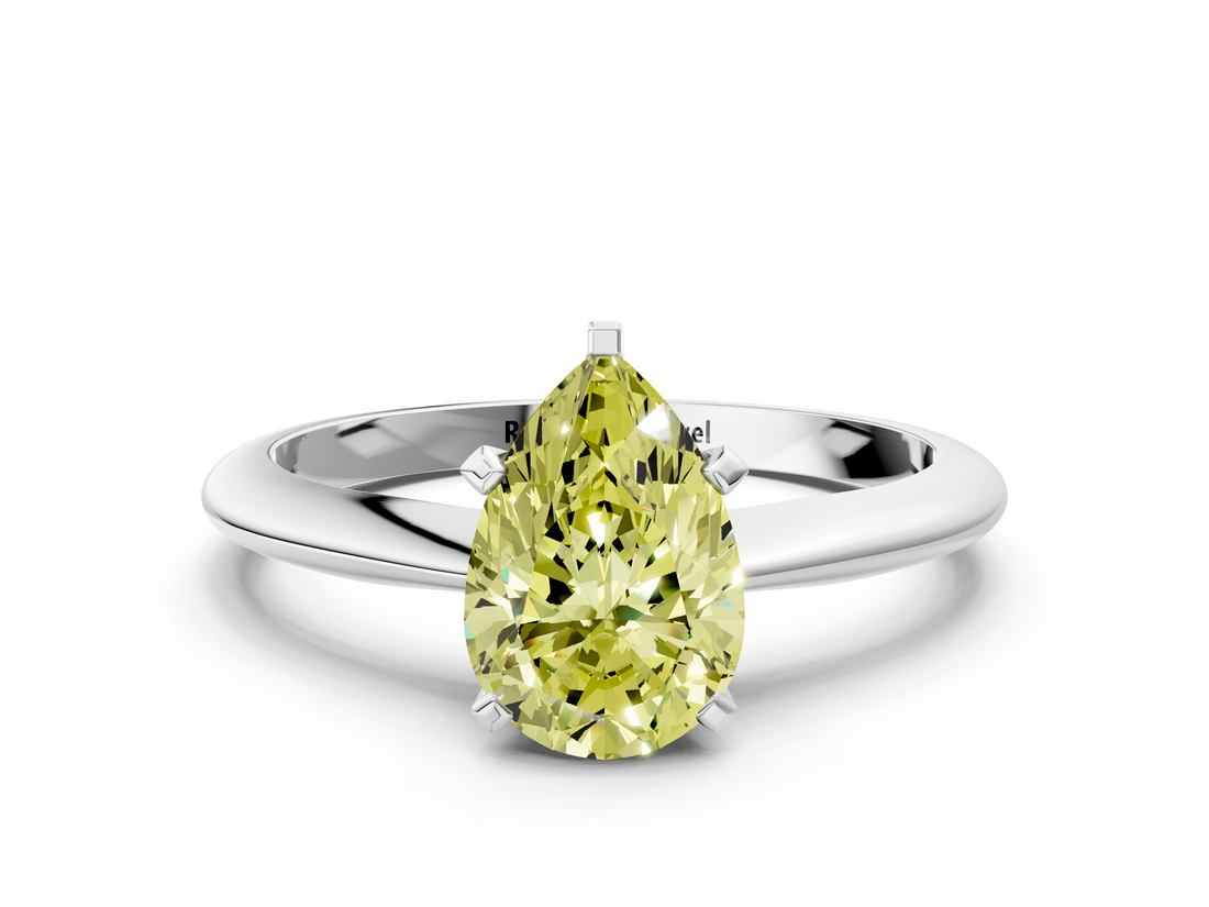 White gold Fancy Yellow Pear  Cut Solitaire Ring with Four-Prong Setting on a Classic Band_59