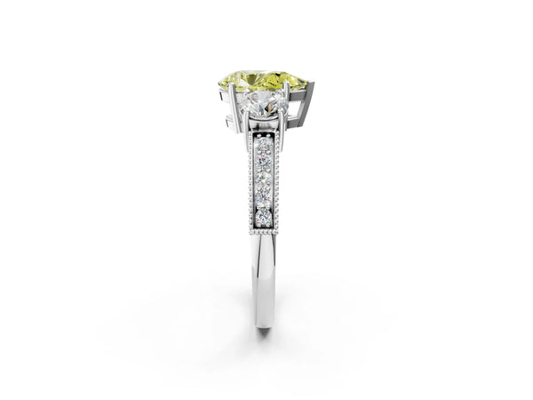White gold Fancy Yellow Pear Cut Three-Stone Diamond Ring with Pavé Band and Four-Prong Setting
