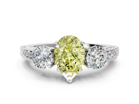 White gold Fancy Yellow Pear Cut Three-Stone Diamond Ring with Pavé Band and Four-Prong Setting