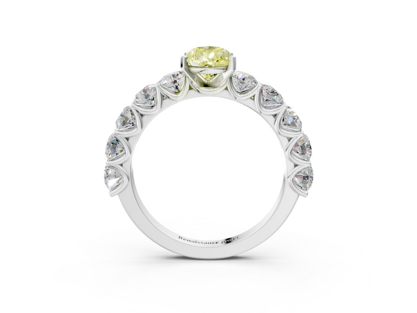 Platinum Fancy Yellow Pear Cut Diamond Prong Setting with Side Stones on a Pave Band
