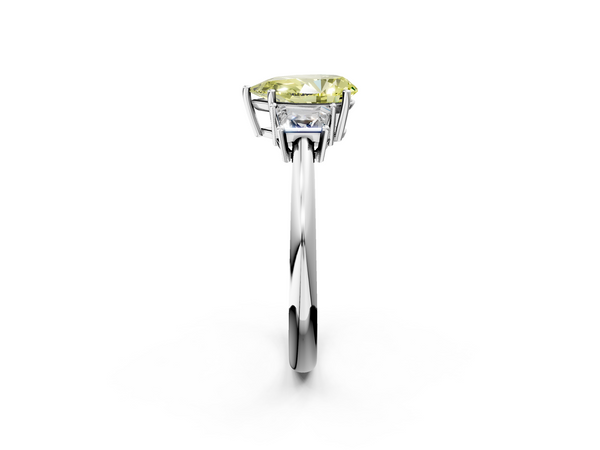 Platinum Fancy Yellow Pear  Diamond Three-Stone Ring with Trapezoid Side Stones and Prong Setting