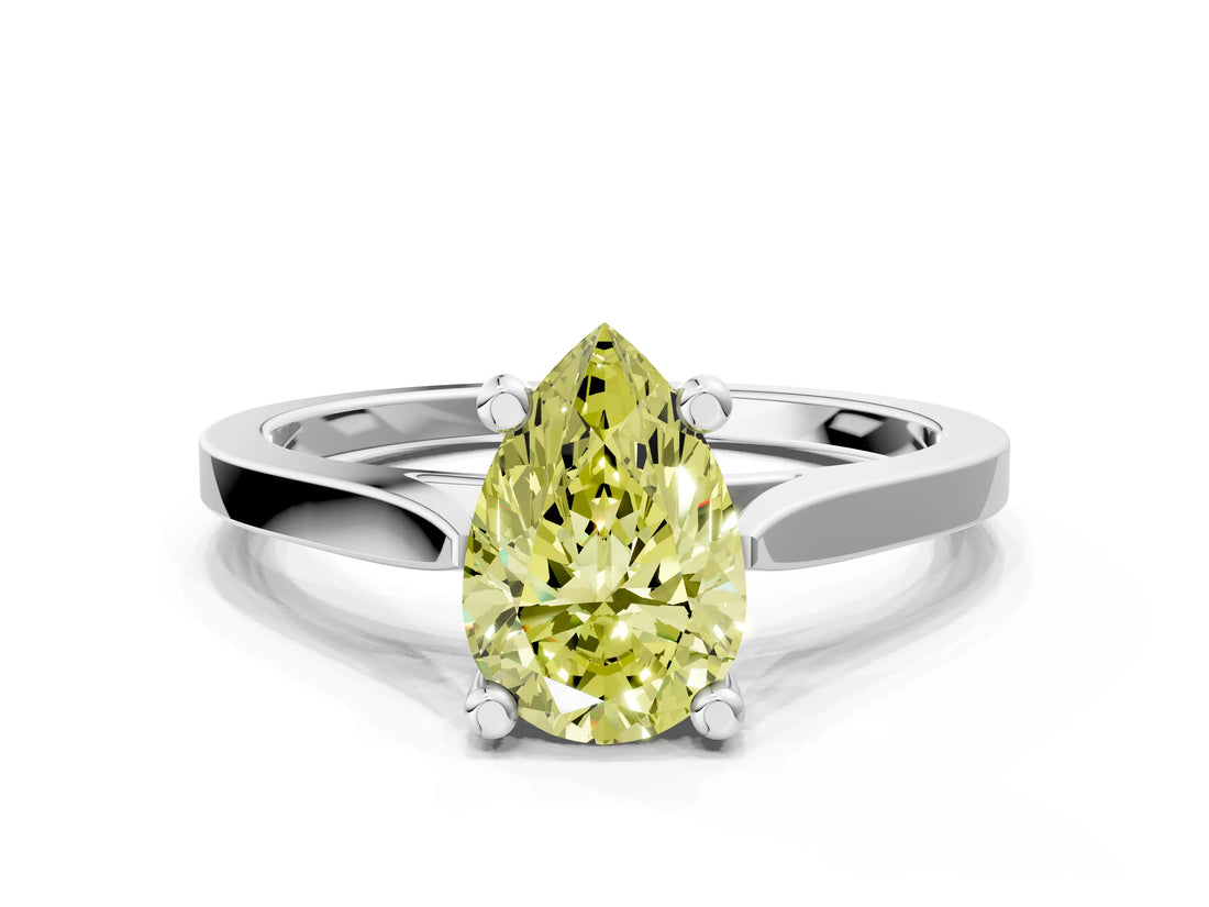 White gold Fancy Yellow Pear  Solitaire Diamond Ring with Four-Prong Setting and Tapered Band