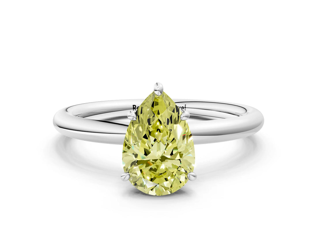 White gold Fancy Yellow Pear  Solitaire Diamond Ring with Four-Prong Setting on a Plain Band_32