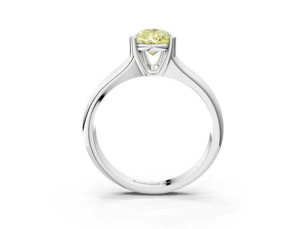 Platinum Fancy Yellow Pear Cut Diamond Solitaire Ring with Wide Band and Prong Setting