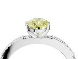 White gold Fancy Yellow Pear  Solitaire with Pavé Band and Four-Prong Setting_350