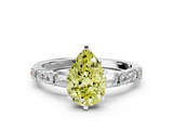 White gold Fancy Yellow Pear  Solitaire with Side Baguettes and Channel Set Band_64