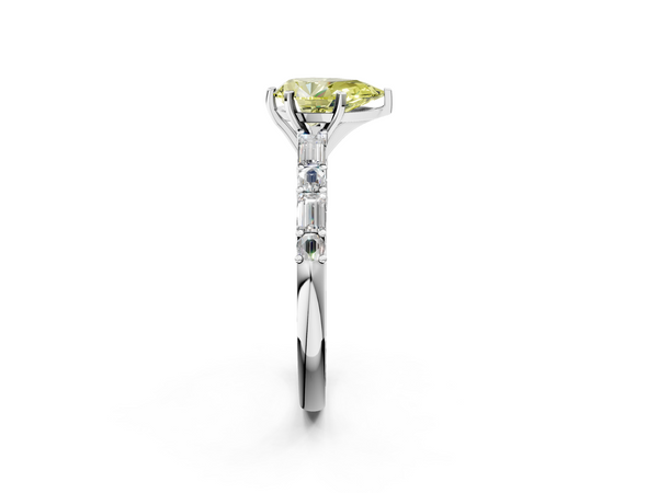 White gold Fancy Yellow Pear Cut Diamond Solitaire with Side Baguettes and Channel Set Band