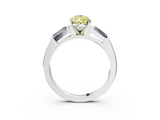White gold Fancy Yellow Pear  Solitaire with Tapered Baguette Side Stones on a Classic Band with Four-Prong Setting_90