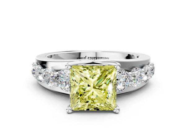 White gold Fancy Yellow Princess  Brilliant Solitaire with Side Stones on a Pave Band and Four-Prong Setting