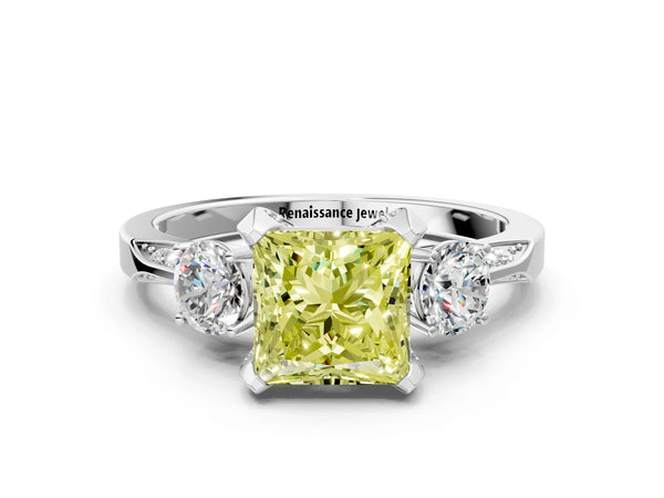 White gold Fancy Yellow Princess Cut Brilliant Three-Stone Diamond Ring with Pavé Band and Four-Prong Setting