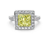 White gold Fancy Yellow Princess Cut Diamond Halo Ring with Pavé Band and Prong Setting