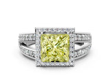 White gold Fancy Yellow Princess Cut Diamond Halo Ring with Split Shank Pavé Band and Four-Prong Setting