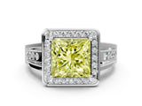 White gold Fancy Yellow Princess Cut Diamond Halo Ring with Split Shank and Bezel Accents and Prong Setting