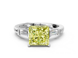 White gold Fancy Yellow Princess  Cut Diamond Solitaire Ring with Tapered Baguette Accents and Four-Prong Setting